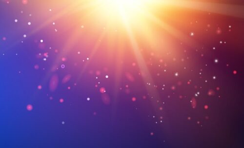 Un ciel bleuté abstrait où rayonne un soleil entouré de petits points de lumière