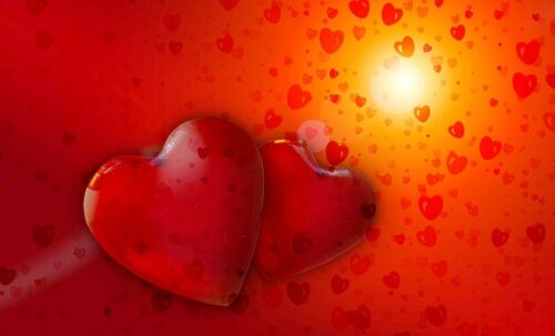 Deux cœurs côte à côte au côté de la Source de Lumière divine