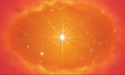 Des étoiles scintillantes dans un ciel de lumière rouge orangé