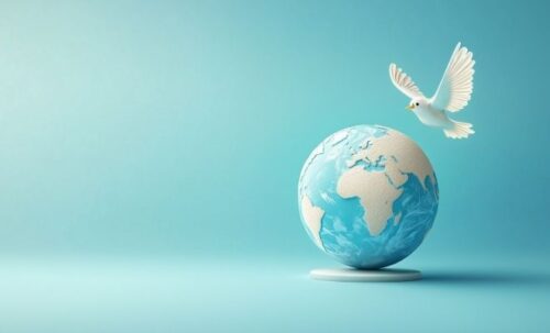Une colombe survolant un globe terrestre