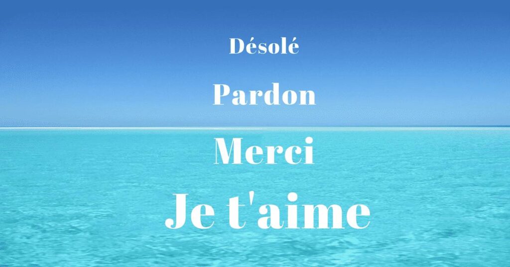 Désolé, Pardon, Merci, je t'aime écrits avec en fond, la mer et le ciel