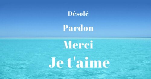 Désolé, Pardon, Merci, je t'aime écrits avec en fond, la mer et le ciel 