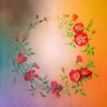 Cercle garni de roses qui fanent sur la fin.