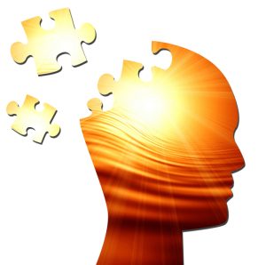 Le soleil dans un silhouette en forme de tête et qui se décompose en puzzle