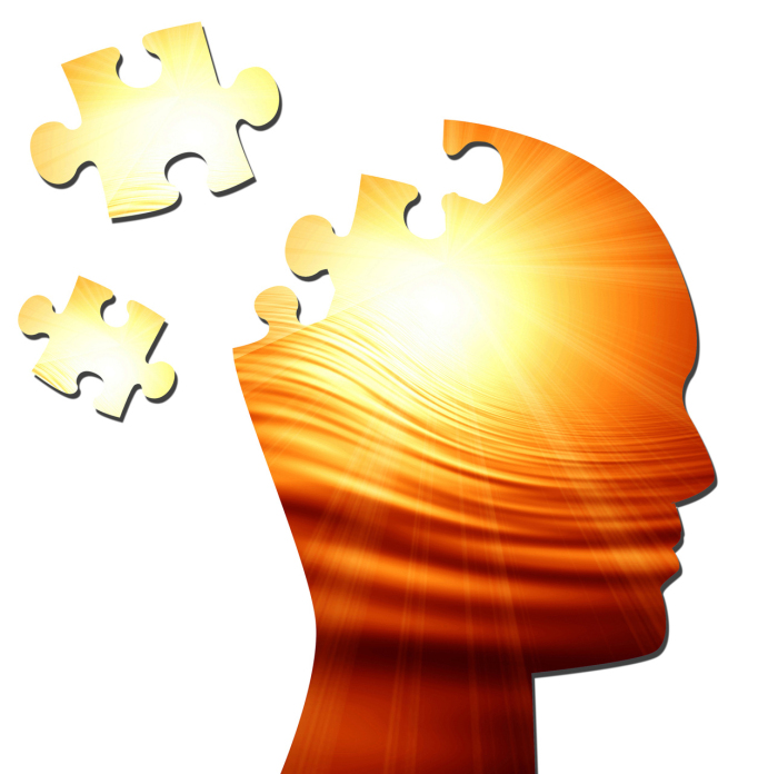 Le soleil dans un silhouette en forme de tête et qui se décompose en puzzle